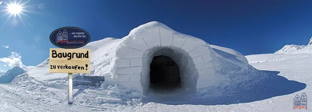 Ein Iglu in einer Schneewüste mit einem Schild davor
